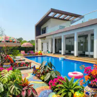 Maximalist style: the same backyard, more is more with bold patterns